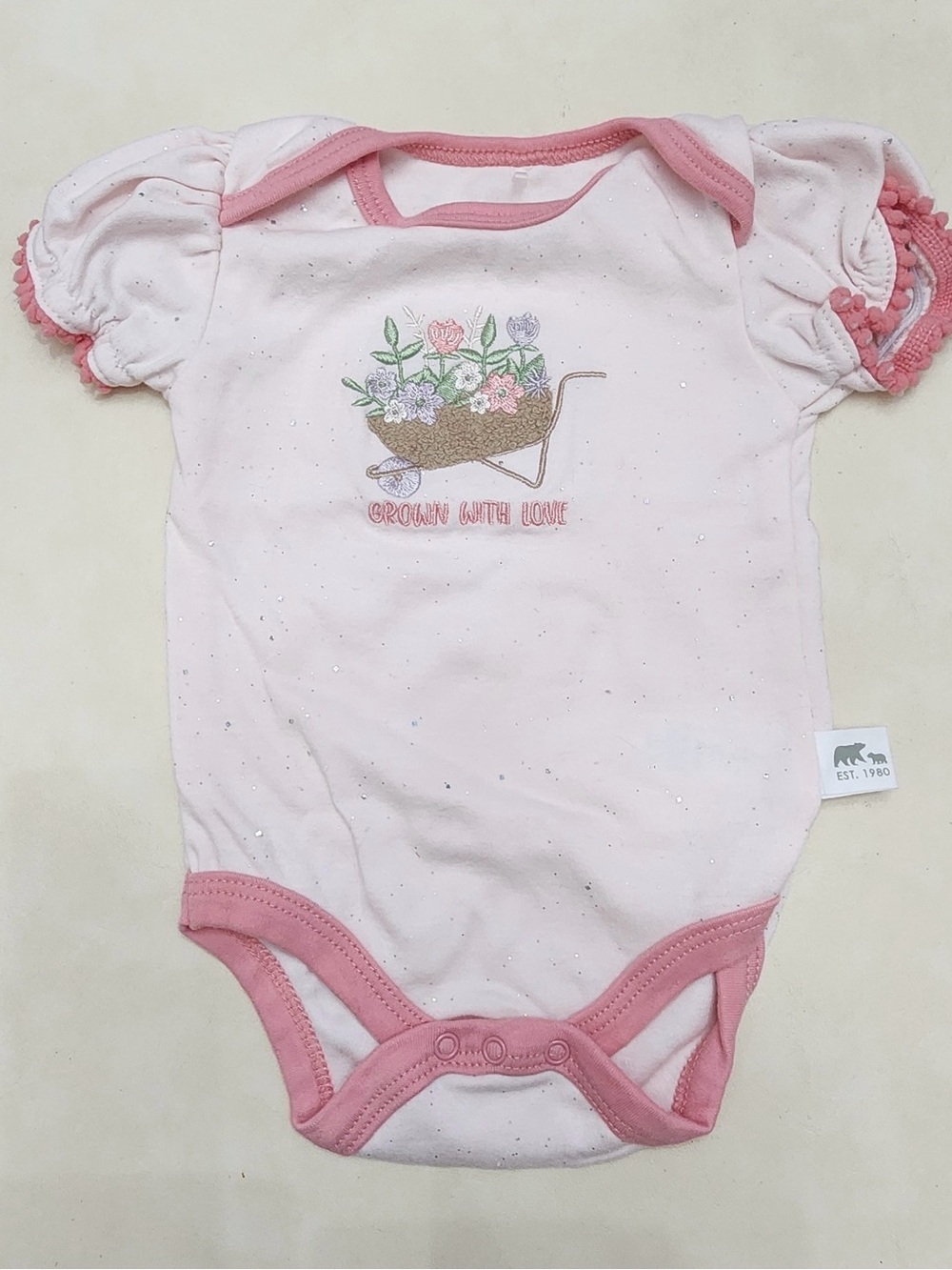 Pink Floral Wheelbarrow Baby One-Piece with Ruffle Sleeves